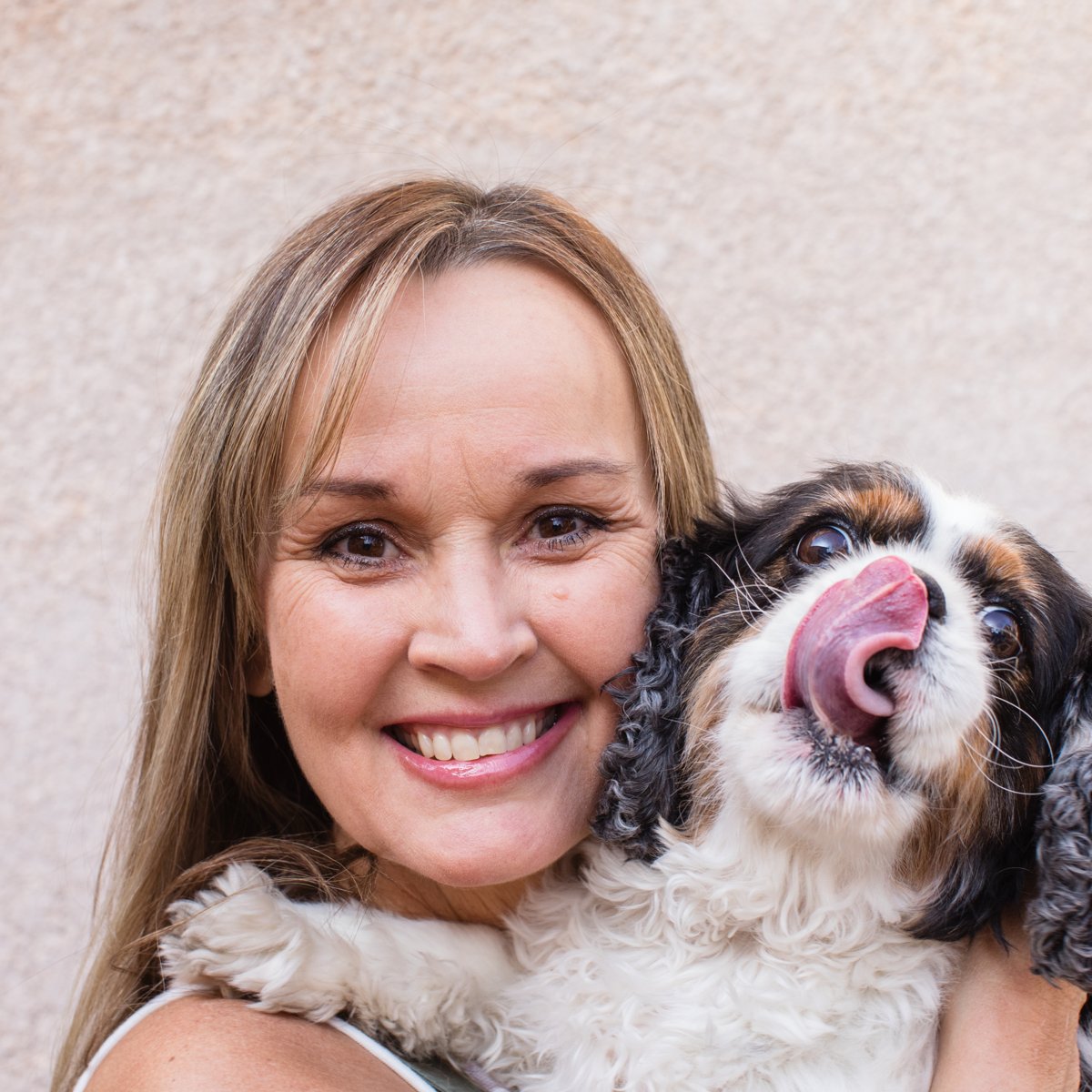 Buster licking Nicole's cheek