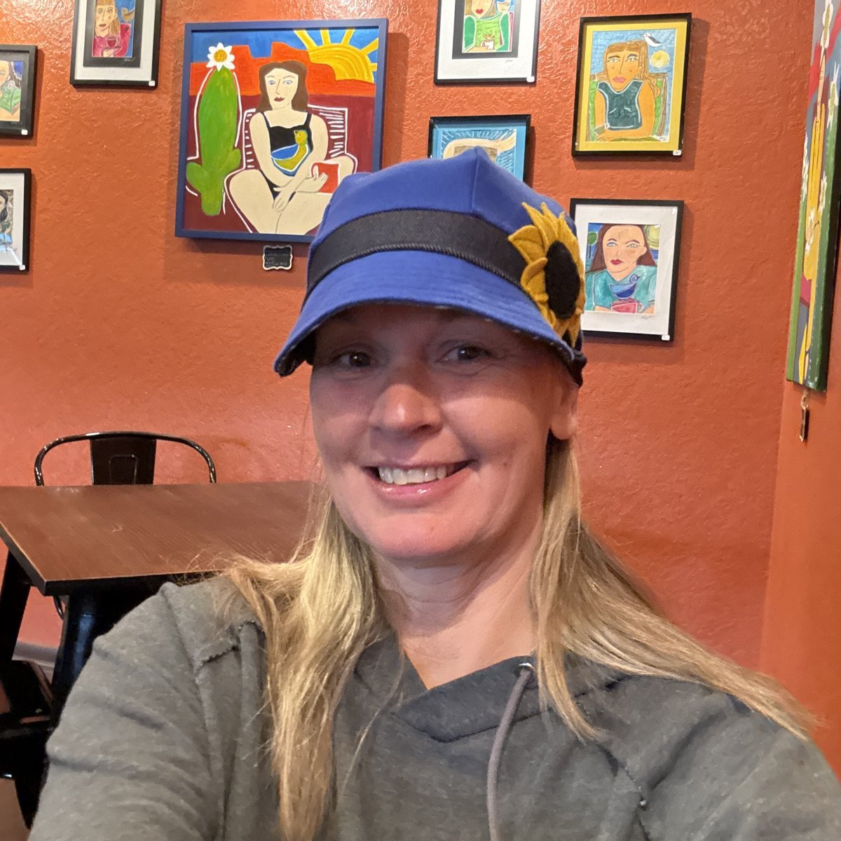 Nicole in a hat, undercover